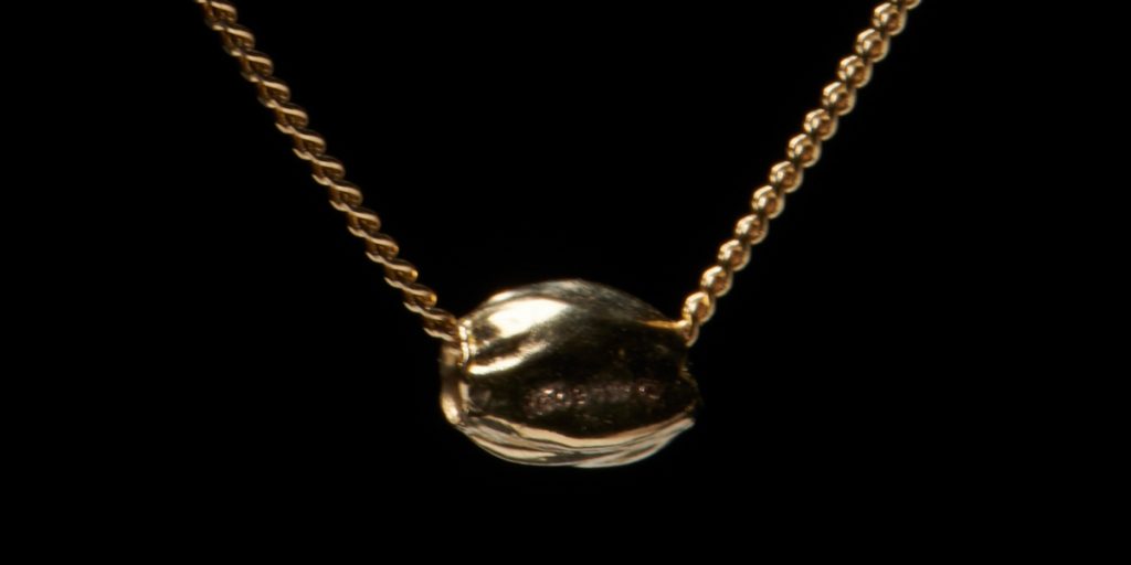 10K GOLD CANNABIS SEED SLIDER AND CHAIN