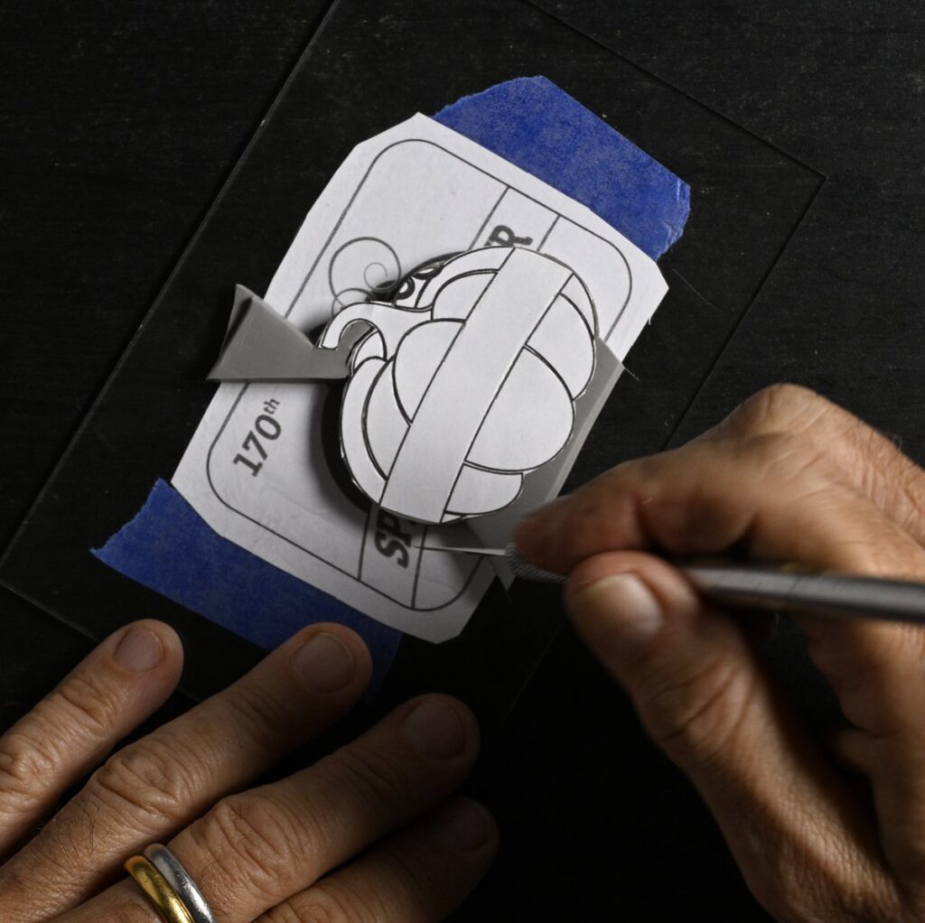 shaping the main trophy belt buckle design in clay